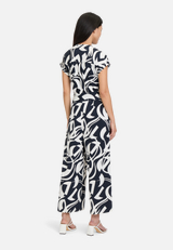 Jumpsuit mit Eingrifftaschen / Modellfoto Rückseite