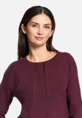 Feinstrickpullover mit Seitenschlitzen / Detailbild