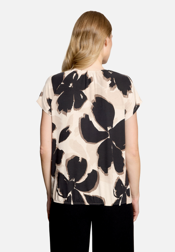 T-Shirt  mit Blumendruck und Glitzer / Modellfoto Rückseite