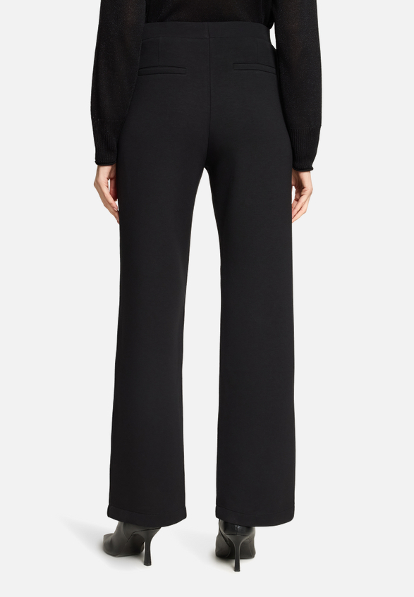 Schlupfhose mit Eingrifftaschen / Modellfoto Rückseite